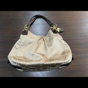 Coach champagne logo print with leather straps